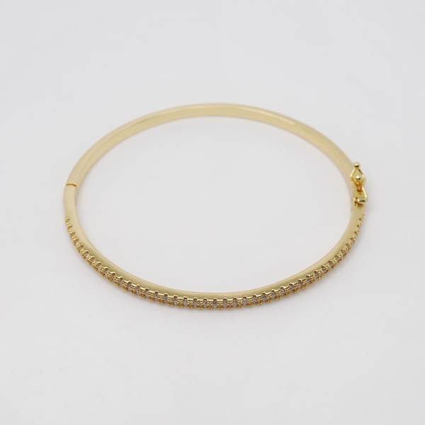 Bilde av Armring i gull med steiner blank