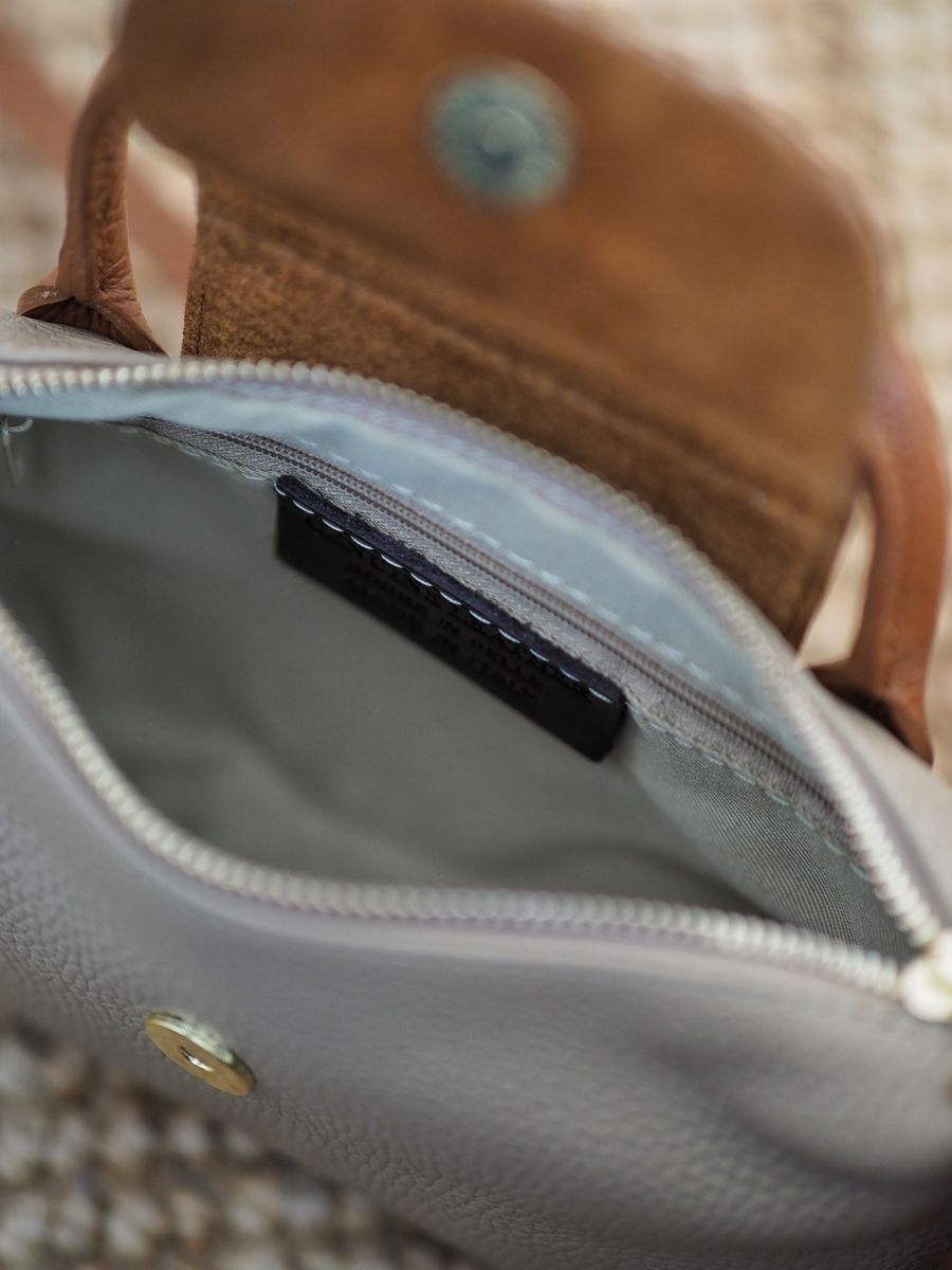 Liten skinnveske beige og cognac