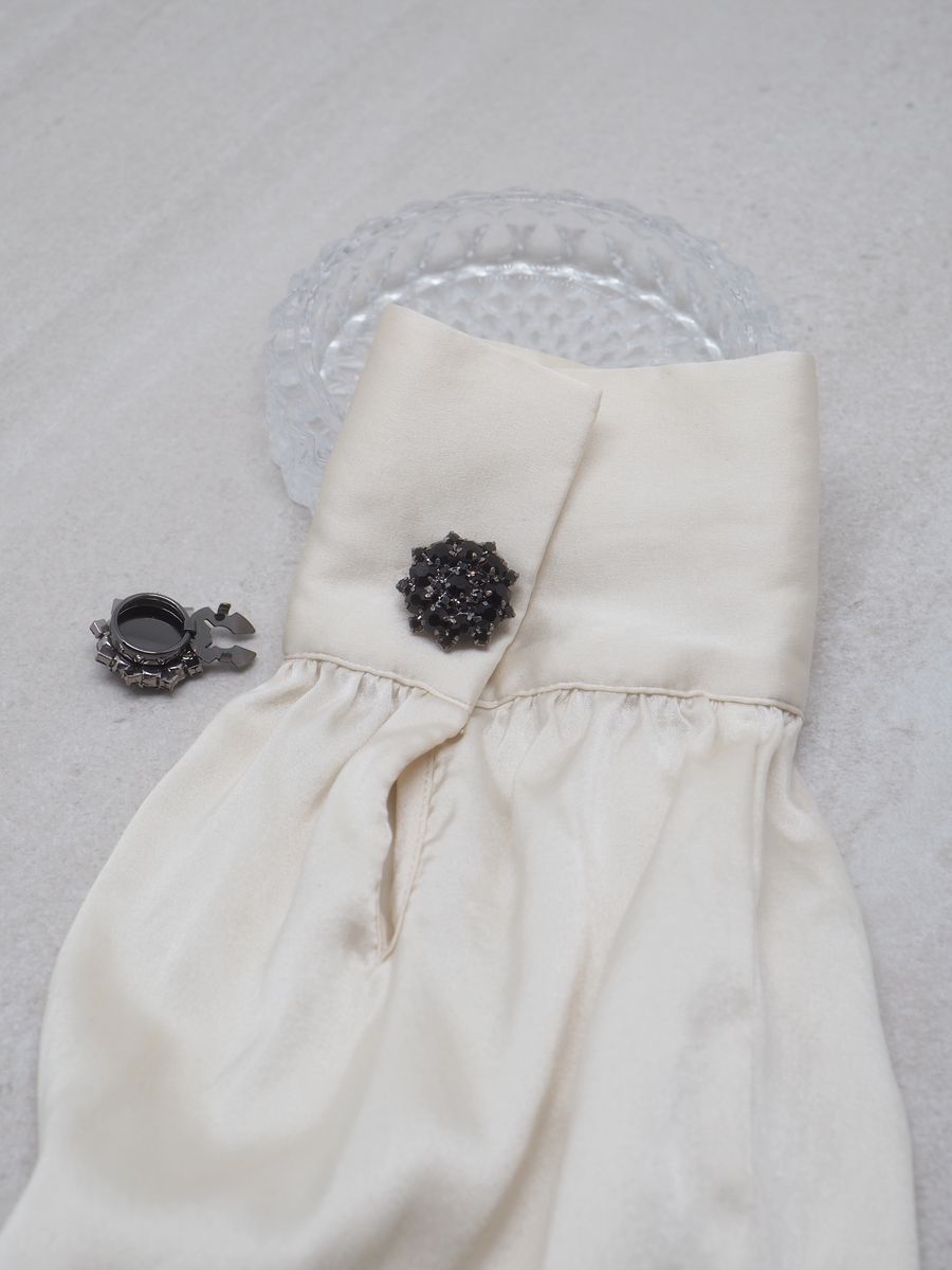 Knappepynt 2stk svart 