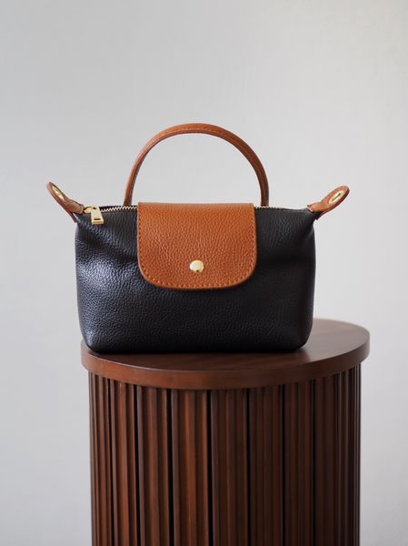 Hovedbilde Liten skinnveske svart og cognac