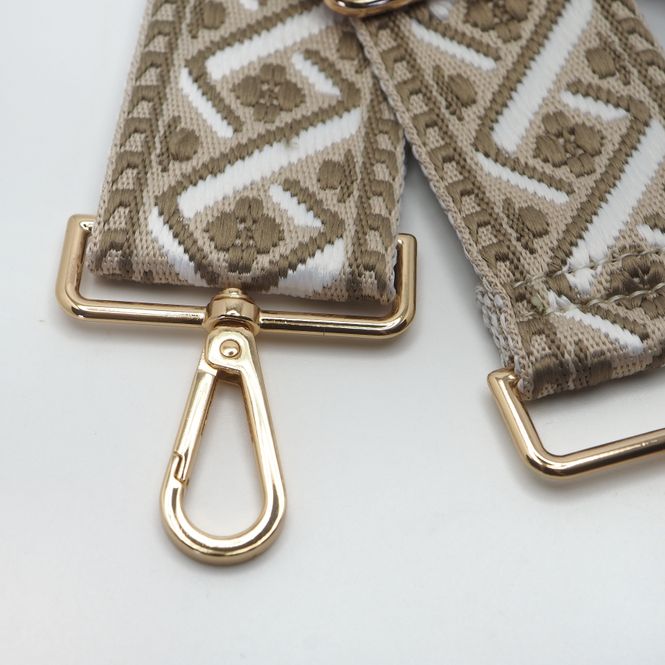Hovedbilde Veskestropp med geometrisk mønster beige