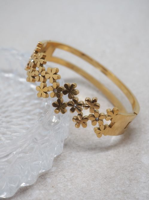 Hovedbilde Armring 2-rader med blomster stål gullfarget